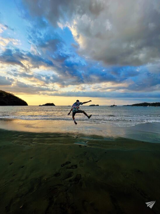 enjoying the sunset over the cost of Pacific ocean in Costa Rica