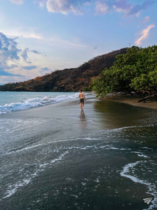 walk on the beach of Pacific ocean in Costa Rica